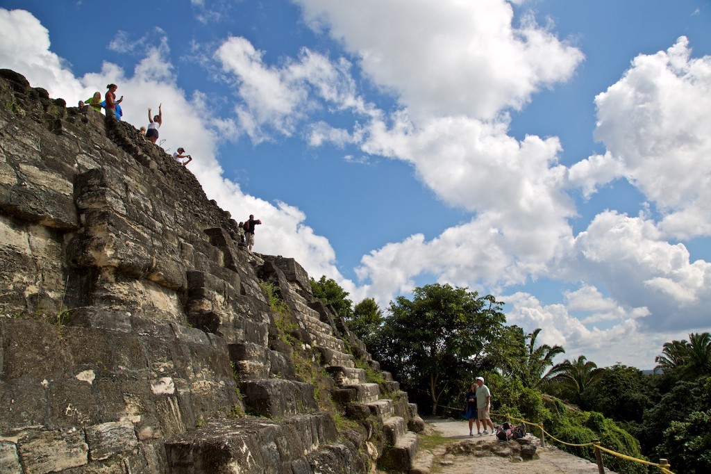When was the last time you walked to the top of a temple? Best. Travel. Story. Ever! Central and South American Ruins Image: A group of travellers celebrates having reached the top of the temple. Whilst a couple admires them, and considers making the walk themselves.