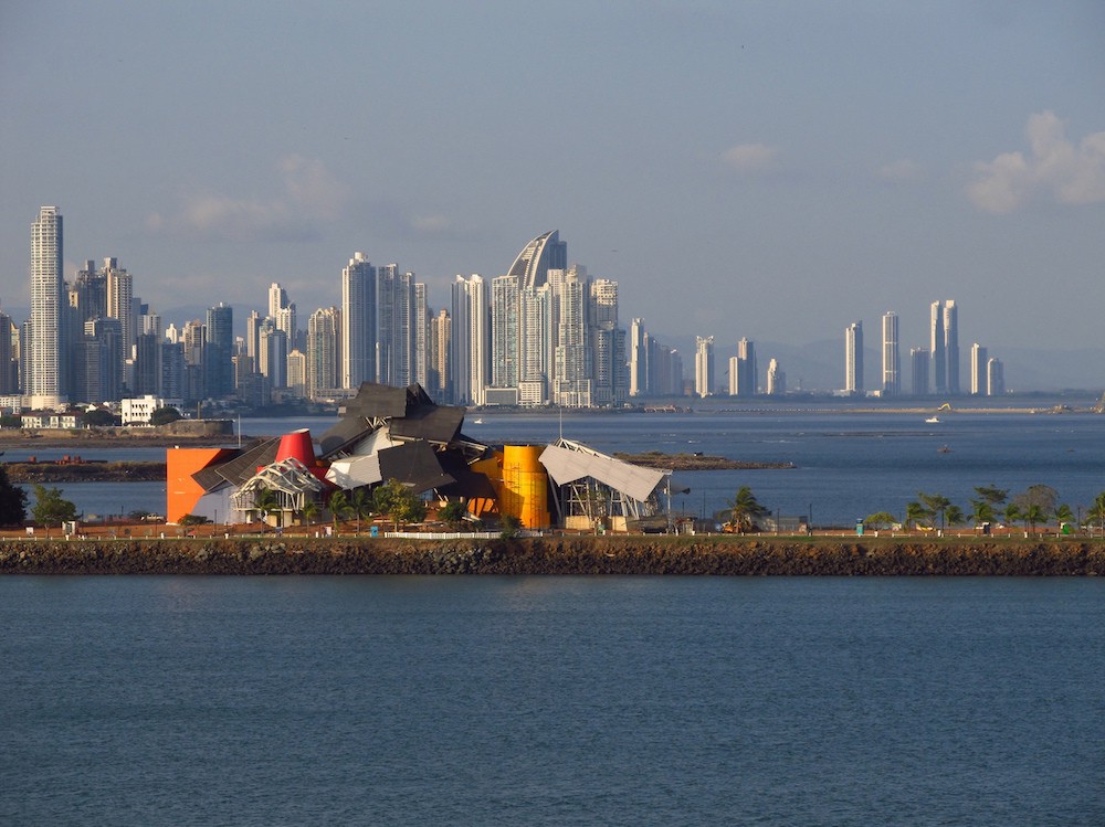 Always remember to pause and admire the shapes found in a city's skyline. Architecture In Panama Image: Another view of the Gehry building shows us Panama City's architectural skyline, which includes cylinders, and a curved wedge.