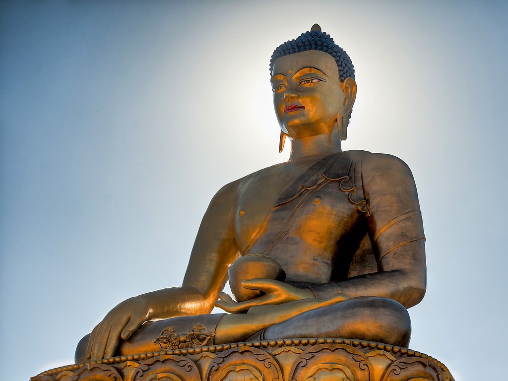 You observe Budda Dordenma, and Buddha Dordenma overlooks the city. Destinations Worth Dreaming Image: The golden Buddha Dordenma statue has a slight smile, and holds a bowl.