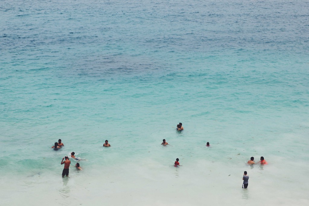 You too can splash and play in Mexico's warm blue ocean waters. Destinations Worth Dreaming Image: People are swimming and playing in Mexico's warm blue ocean waters.