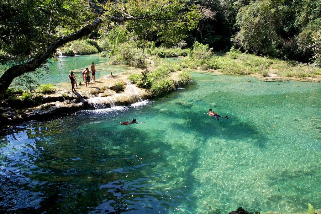 So many pools, so little time. Swimming Holes Image: Several people are pictured taking in the view of the swimming holes, and enjoying a swim in their waters.