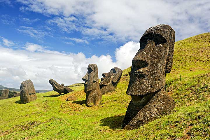 Contrary to popular belief, moai aren't just heads, but full statues. Destinations Worth Dreaming Image: Five moai are visible—three are upright; one is tilted forward, and another is tilted back.