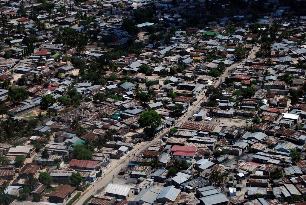 Discover how cities in Tanzania differ, and how they're just like home. Destinations Worth Dreaming Image: An aerial view of a thriving city scene in Tanzania.