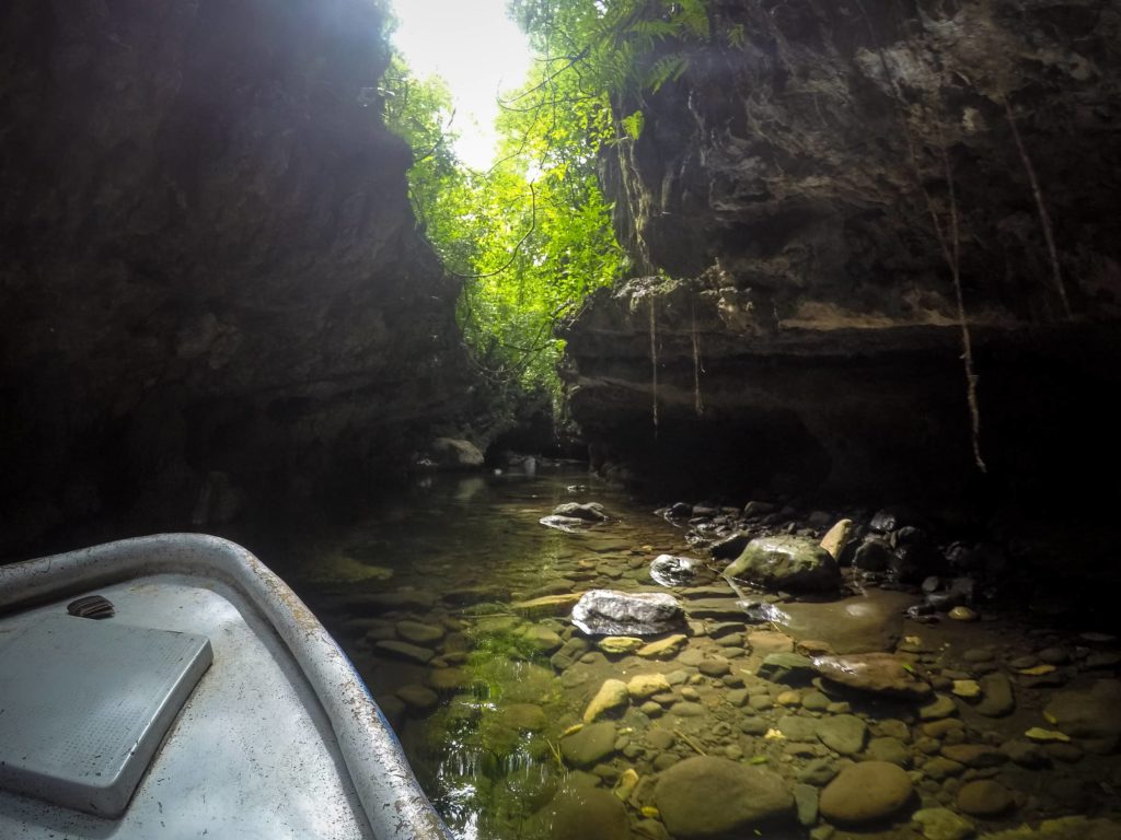 There is life within caves, but it's different from what we're accustomed to—lush greenery and warm sunlight. Cave Floating Image: A photograph from Michiel Dros' website "Around The World .Me" An opening in the cave lets light stream through as a boat can go no further in the water.