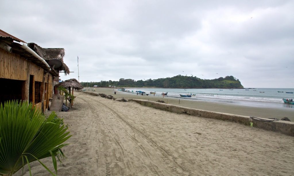 Right on the beach? We'd say so—there's sand just outside of the door. Best Beaches Image: Ecuador. A building sits right on the beach—sand is right outside of the door.