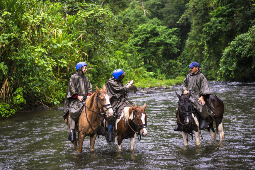 To be fair, it's not everyday one gets to take a selfie of this calibre. Costa Rica Adventure Trips Image: A woman takes a selfie on a white and brown horse while crossing the river Arenal on horseback near the small town of La Fortuna, in Costa Rica.