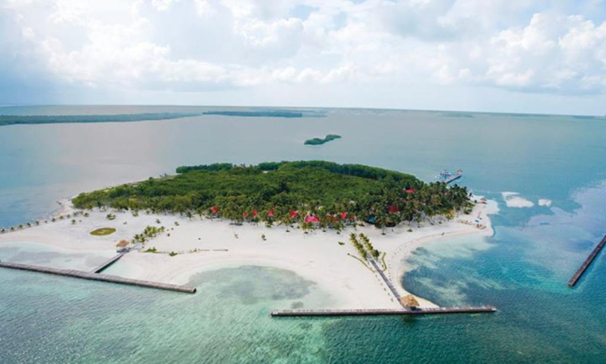 Nice photo. Just wait until you see it up-close... Best Beaches for Swimming in Belize Image: An Aerial view of Turneffe, showing docks, sand, and a lush, central green space.