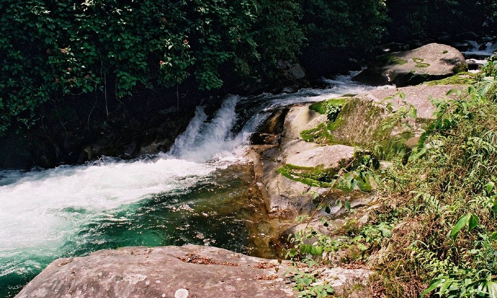 Wait for it...there's an epic adventure right around the corner. Costa Rica Rafting Image: A flowing stream has formed a small pool, but theres an epic adventure right around the corner.