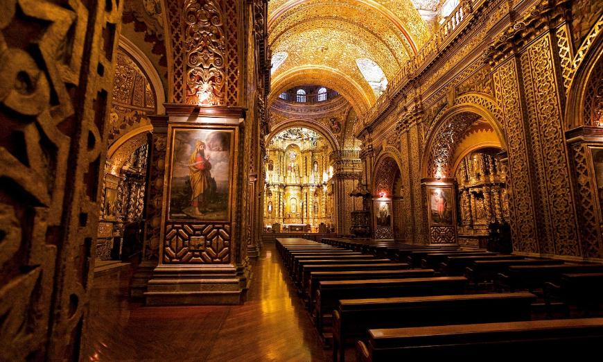 It's good to be overwhelmed by beauty on your wedding day. Destination Wedding in Ecuador Image: Warm wooden pews, artwork, and the golden interior of La Compañía de Jesús cathedral.