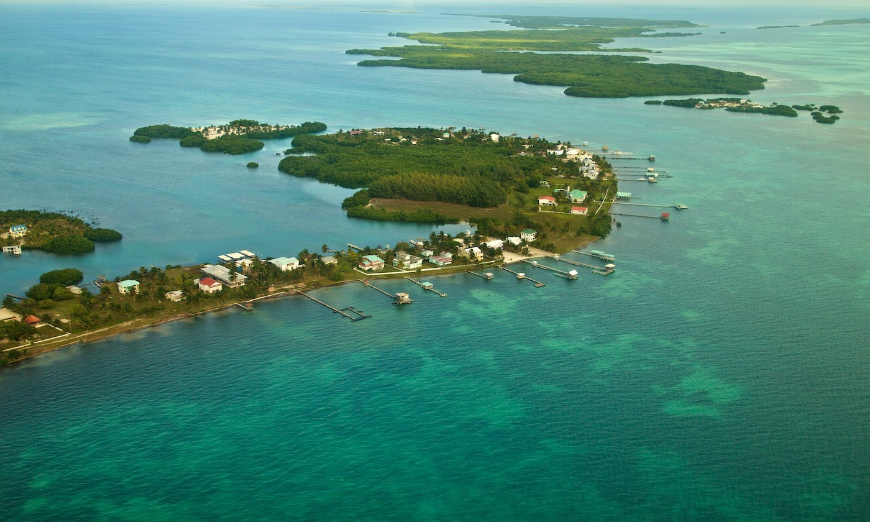 Belize offers beautiful beachside accommodations, so you're sure to enjoy your holiday even after you resurface. Diving In Belize Image: An aerial view of the Turneffe Islands..
