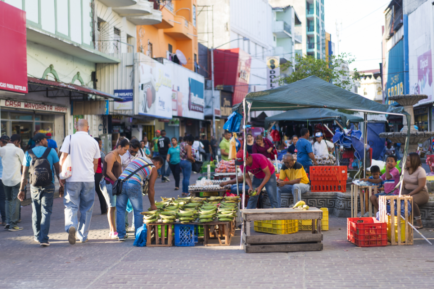 Remember, live your new life to the fullest! Get out there and explore your new home! Moving to Panama Image: An outdoor market is full of stalls; people mill about what appears to be a fruit stand.