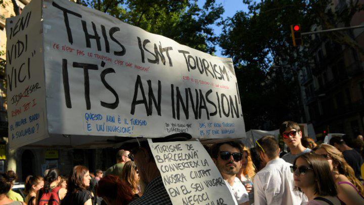One can imagine that Barcelona and Venice didn't get THIS upset over respectful visitors from around the world... Sustainable Travel Image: Barcelona protestors take to the streets with signs decrying over-tourism.