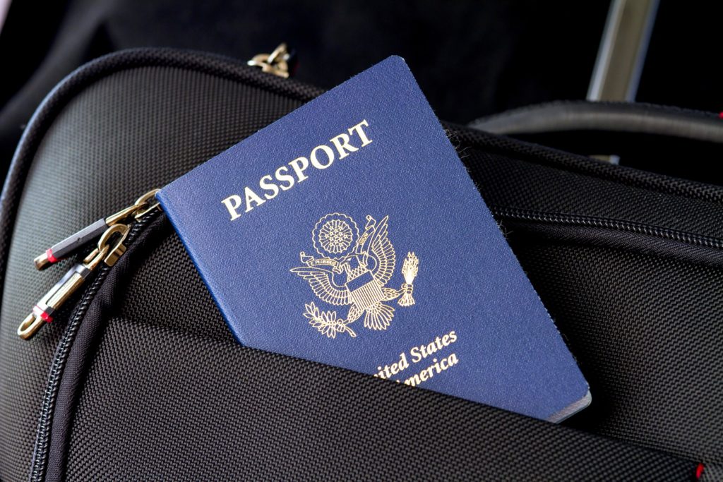This isn't Miami or Las Vegas. You can't just head to Cuba for the weekend. Legally Travel To Cuba Image: A navy blue United States passport peeks out of the front pocket of black luggage.