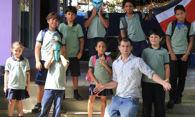 Improving upon an already impressively sustainable country is a bright future to look forward to. Why Is Costa Rica The Happiest Country Image: Schoolchildren and their teacher pose in front of steps.